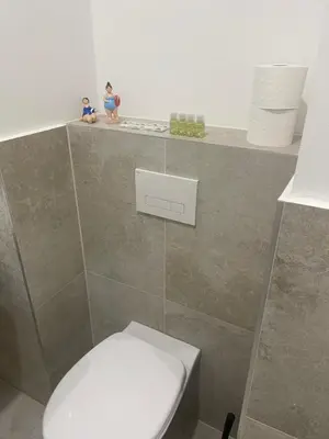 Ein Badezimmer in der Unterkunft New Apartment with Balcony 11