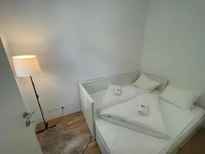 Ein Bett oder Betten in einem Zimmer der Unterkunft New Apartment with Balcony 11
