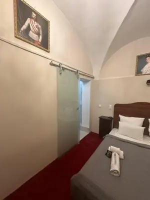 Ein Bett oder Betten in einem Zimmer der Unterkunft DATRI Petite Suite 8