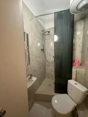 Ein Badezimmer in der Unterkunft DATRI Petite Suite 8