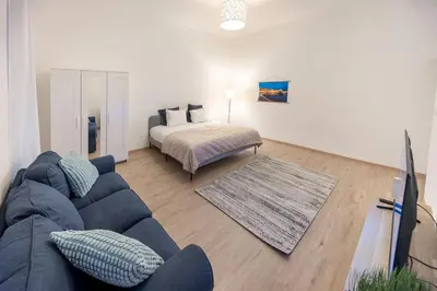Ein Bett oder Betten in einem Zimmer der Unterkunft Second District Charming Flat