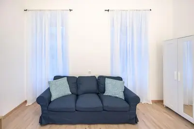 Ein Sitzbereich in der Unterkunft Second District Charming Flat
