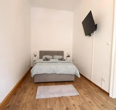 Ein Bett oder Betten in einem Zimmer der Unterkunft Default Tabor 57