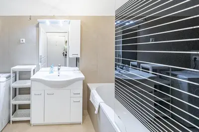 Ein Badezimmer in der Unterkunft Penthouse Suites by JR City Apartments