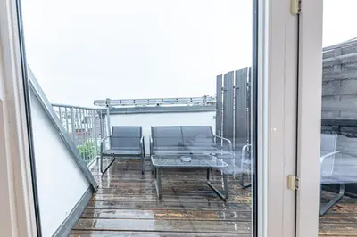Ein Balkon oder eine Terrasse in der Unterkunft Penthouse Suites by JR City Apartments