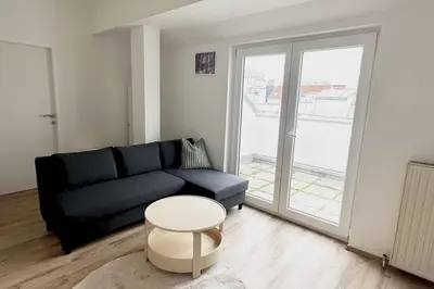 Ein Sitzbereich in der Unterkunft Cozy & New with Balcony View