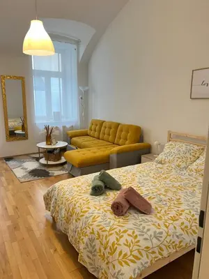 Ein Bett oder Betten in einem Zimmer der Unterkunft Top Location