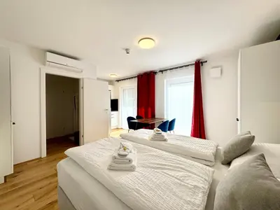 Ein Bett oder Betten in einem Zimmer der Unterkunft Großzügige Wohnung mit Terrasse