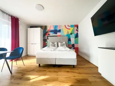 Ein Bett oder Betten in einem Zimmer der Unterkunft Großzügige Wohnung mit Terrasse