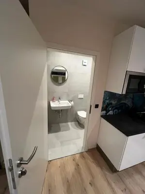 Ein Badezimmer in der Unterkunft RMI1 - Apartment für Urlauber, Monteure - mit AC und Infrarotheizung