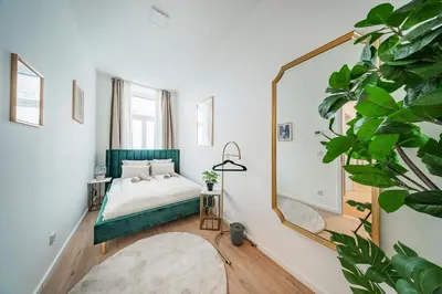 Ein Bett oder Betten in einem Zimmer der Unterkunft SEVEN Rooms Vienna