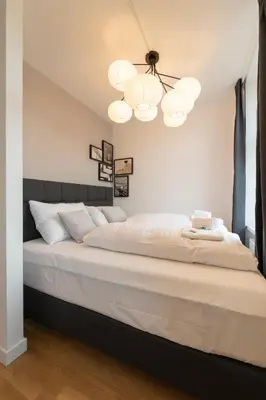 Ein Bett oder Betten in einem Zimmer der Unterkunft josef's home I Premium Apartment I Near Center
