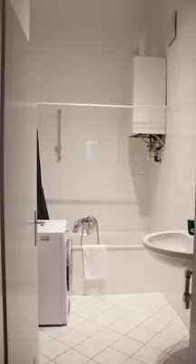 Ein Badezimmer in der Unterkunft josef's home I Urban Classic Apartment I 02