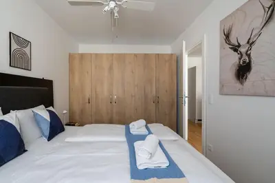 Ein Bett oder Betten in einem Zimmer der Unterkunft Urban 1BR Retreat, Easy City Link by HM