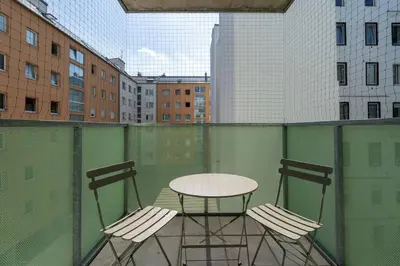 Ein Balkon oder eine Terrasse in der Unterkunft 1BR with Balcony, Urban Style by HM