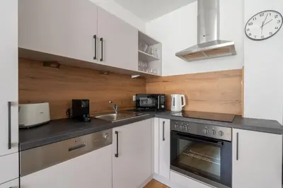 Küche/Küchenzeile in der Unterkunft Trendy 1BR, Direct City Access by HM