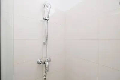 Ein Badezimmer in der Unterkunft Modern Apartment near City Center - 2BR, Netflix