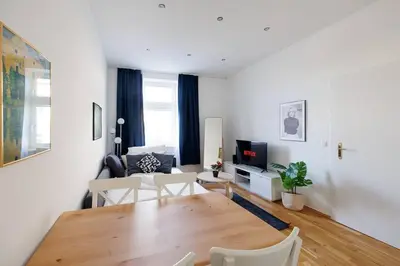 TV/Unterhaltungsangebot in der Unterkunft Modern Apartment near City Center - 2BR, Netflix
