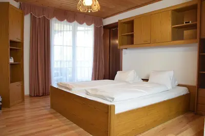 Ein Bett oder Betten in einem Zimmer der Unterkunft Appartmenthaus Rosenhof