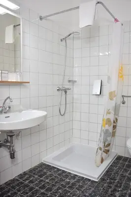 Ein Badezimmer in der Unterkunft Appartmenthaus Rosenhof