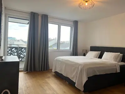Ein Bett oder Betten in einem Zimmer der Unterkunft Gloriette Apartment Vienna