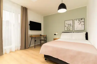 Ein Bett oder Betten in einem Zimmer der Unterkunft Limehome Vienna Favoritenstr