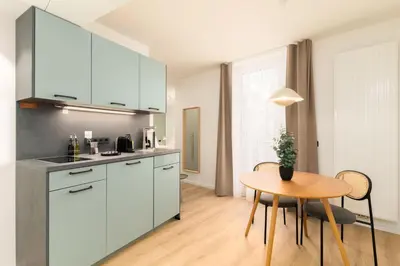 Küche/Küchenzeile in der Unterkunft Limehome Vienna Favoritenstr