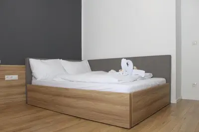Ein Bett oder Betten in einem Zimmer der Unterkunft Christiano Apartments 1060 CITY