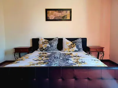 Ein Bett oder Betten in einem Zimmer der Unterkunft Michlhof Mörbisch