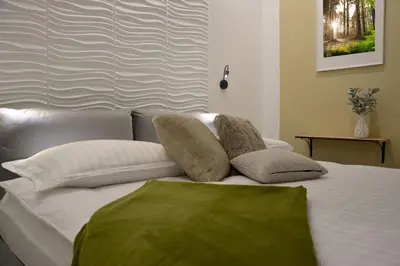 Ein Bett oder Betten in einem Zimmer der Unterkunft MeetsLeopold
