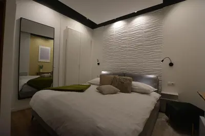 Ein Bett oder Betten in einem Zimmer der Unterkunft MeetsLeopold
