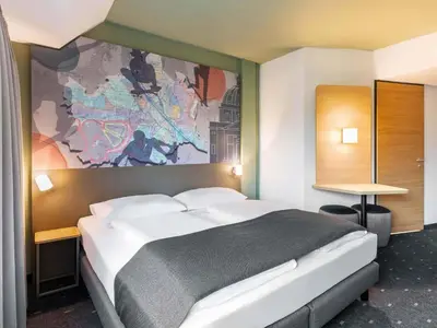 Ein Bett oder Betten in einem Zimmer der Unterkunft B&B HOTEL Wien-St-Marx