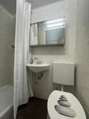 Ein Badezimmer in der Unterkunft Stadthalle charmante Wohnung