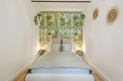 Ein Bett oder Betten in einem Zimmer der Unterkunft Apartment Botanika