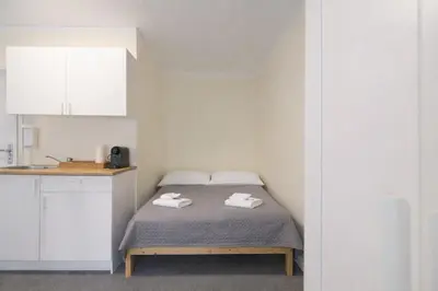 Ein Bett oder Betten in einem Zimmer der Unterkunft DATRI Petite Suite 9