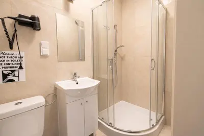 Ein Badezimmer in der Unterkunft DATRI Petite Suite 9