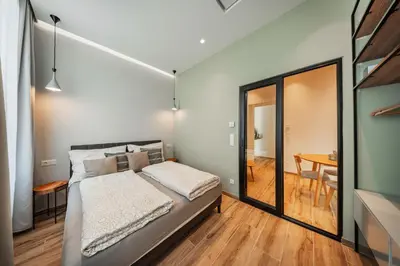 Ein Bett oder Betten in einem Zimmer der Unterkunft TheWICKI 22 - Wunderschöne Apartments in Wien
