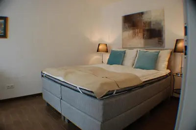 Ein Bett oder Betten in einem Zimmer der Unterkunft Alga Apartments am Westbahnhof