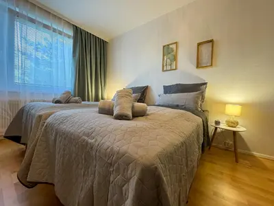 Ein Bett oder Betten in einem Zimmer der Unterkunft revLIVING Kaiser Franz Septima Altstadt Apartment Baden