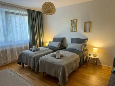 Ein Bett oder Betten in einem Zimmer der Unterkunft revLIVING Kaiser Franz Septima Altstadt Apartment Baden