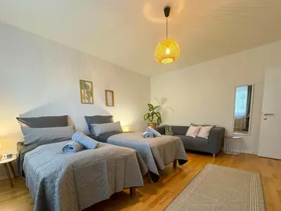 Ein Bett oder Betten in einem Zimmer der Unterkunft revLIVING Kaiser Franz Septima Altstadt Apartment Baden
