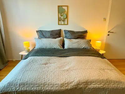 Ein Bett oder Betten in einem Zimmer der Unterkunft revLIVING Kaiser Franz Septima Altstadt Apartment Baden