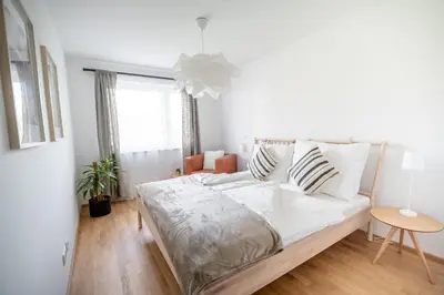 Ein Bett oder Betten in einem Zimmer der Unterkunft Garden Apart Alte Donau
