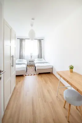 Ein Bett oder Betten in einem Zimmer der Unterkunft Garden Apart Alte Donau