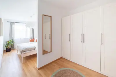 Ein Bett oder Betten in einem Zimmer der Unterkunft Garden Apart Alte Donau