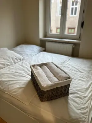 Ein Bett oder Betten in einem Zimmer der Unterkunft Charmante zentral gelegene Wohnung