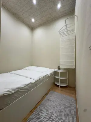 Ein Bett oder Betten in einem Zimmer der Unterkunft Charmante zentral gelegene Wohnung