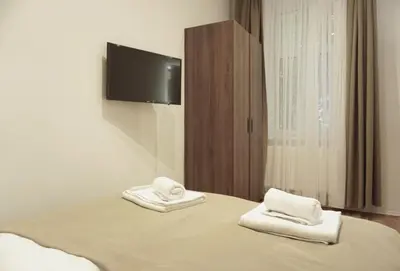 Ein Bett oder Betten in einem Zimmer der Unterkunft Viva La Vienna Apartments