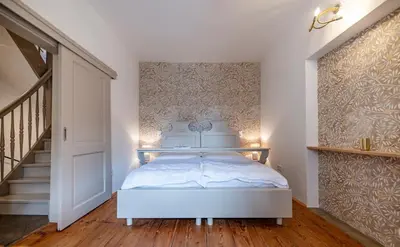 Ein Bett oder Betten in einem Zimmer der Unterkunft Sadje