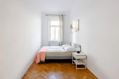Ein Bett oder Betten in einem Zimmer der Unterkunft Wohnung Nahe Schönbrunn